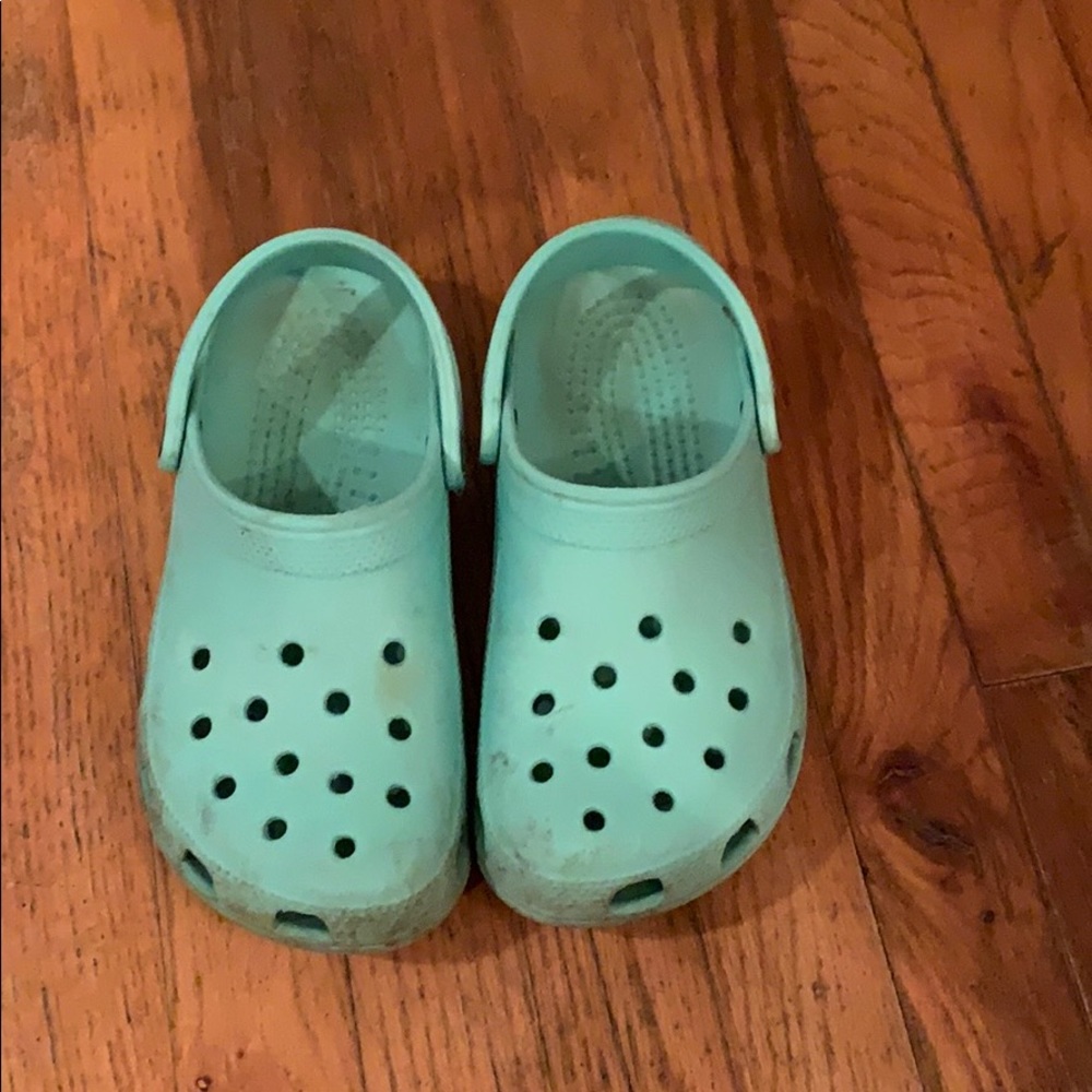 Teal crocs